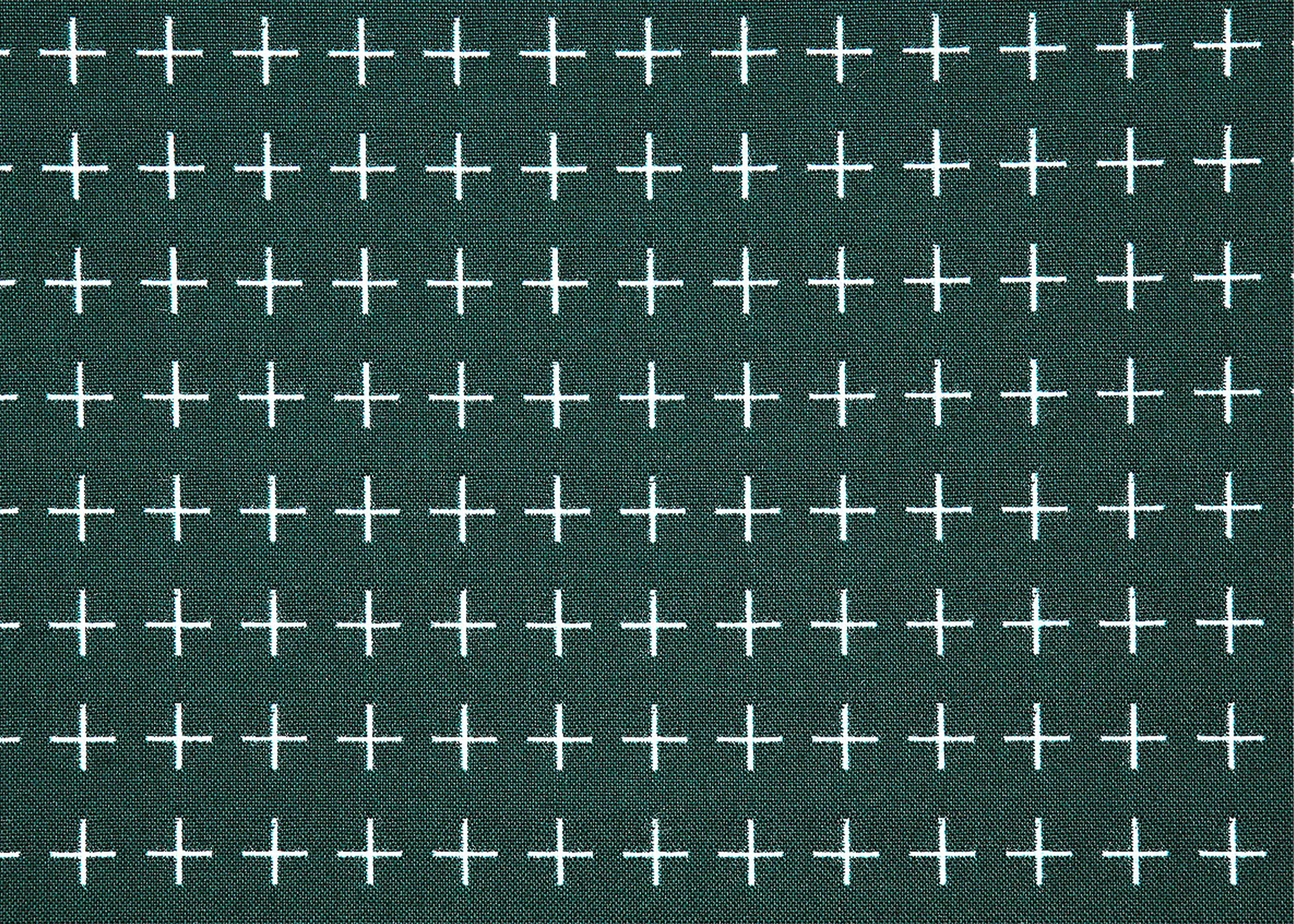 Fabric that is moss green with white plus signs in rows